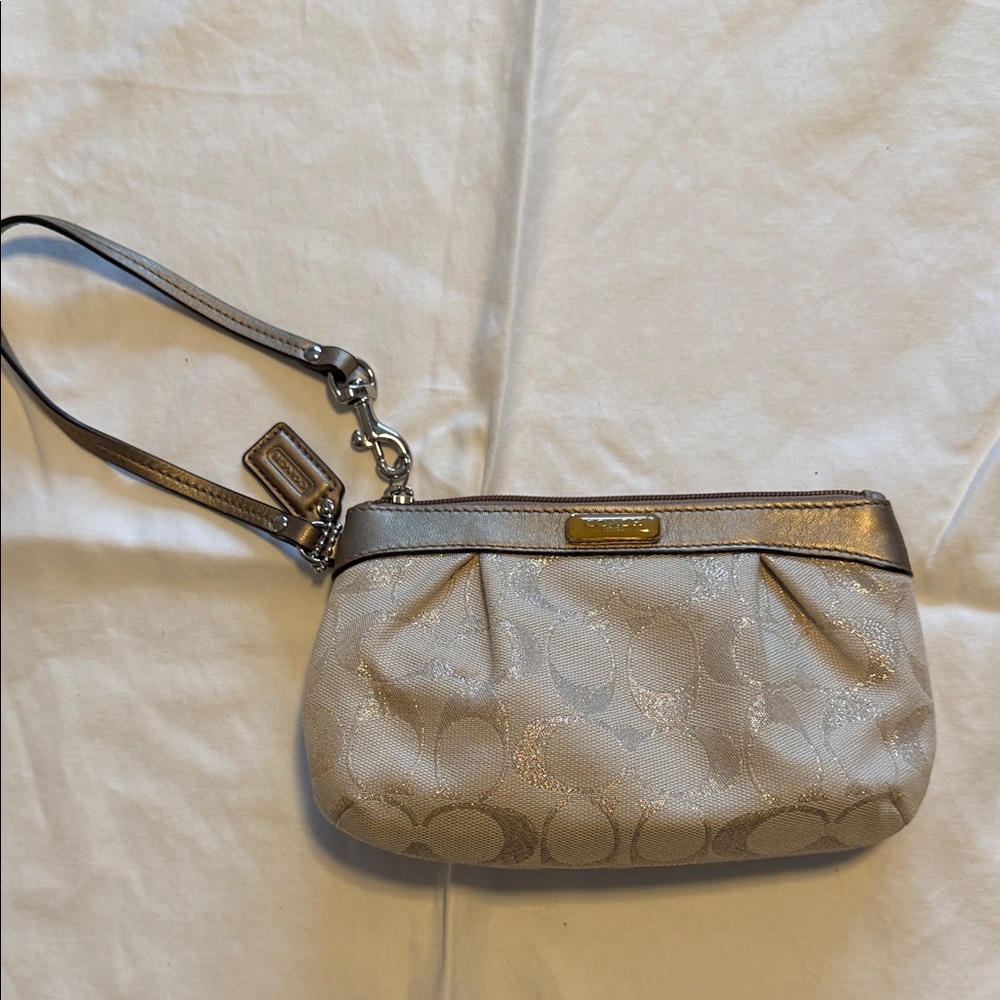 Elegant Cream Coach Wristlet Clutch